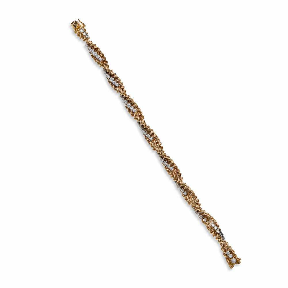 
                      
                        Macklowe Gallery Tiffany & Co. France 18K Gold and Diamond Ropetwist Bracelet
                      
                    